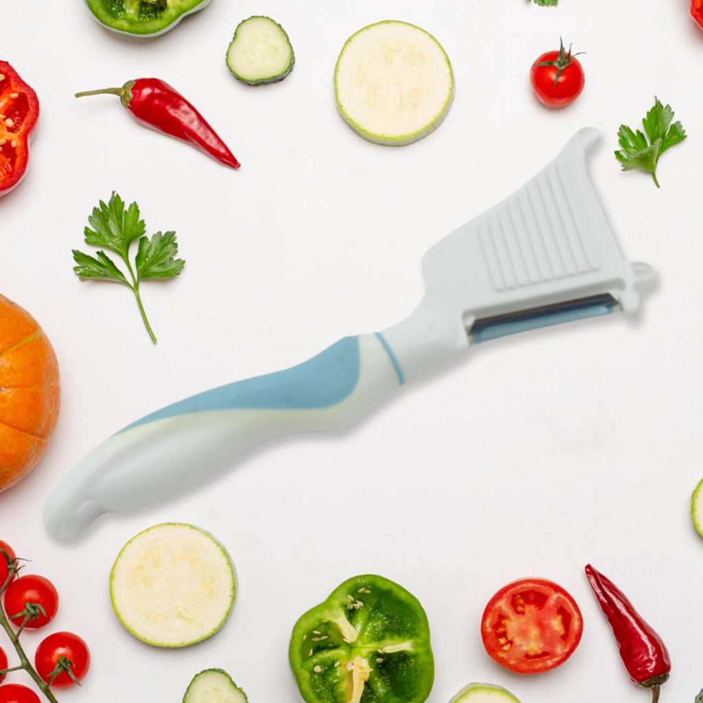 Peeler with brush